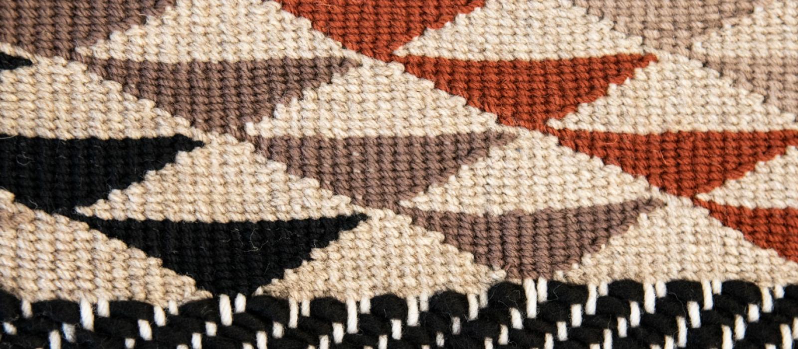 Macro image of a Coast Salish weaving in the library