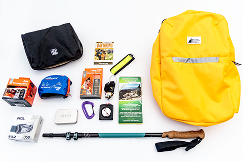 Hiking backpack with contents displayed