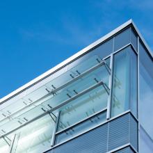 Detail picture of library building with a blue sky in the background