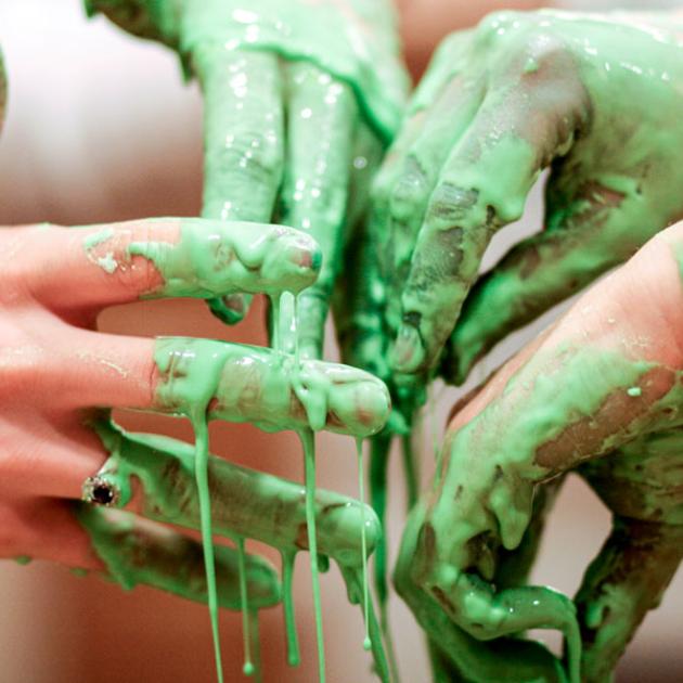 Picture of hands with green slime