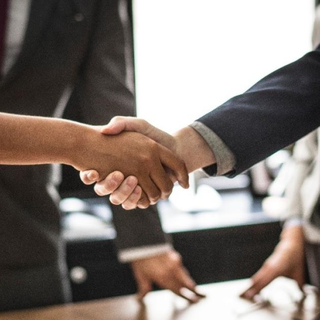 A man and woman shaking hands A man and woman shaking hands