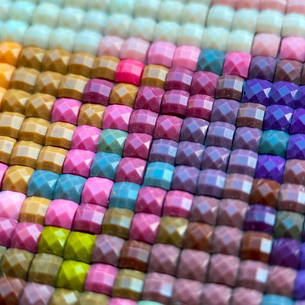 Colourful gems arranged in rows