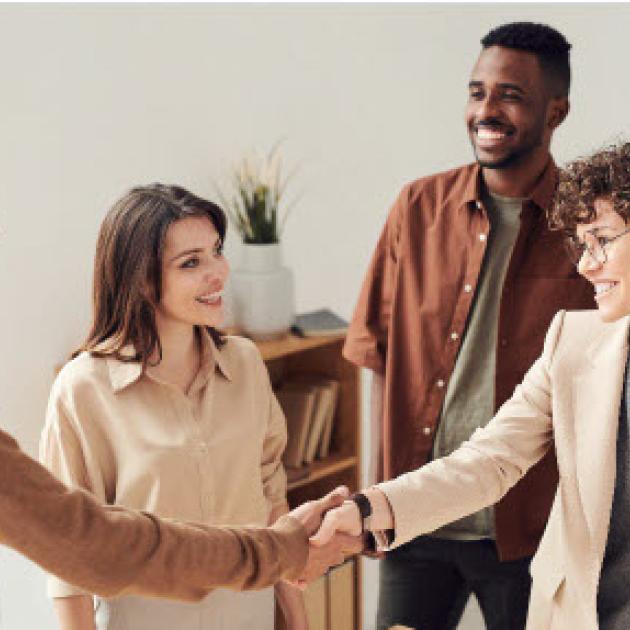employment services Two people shaking hands