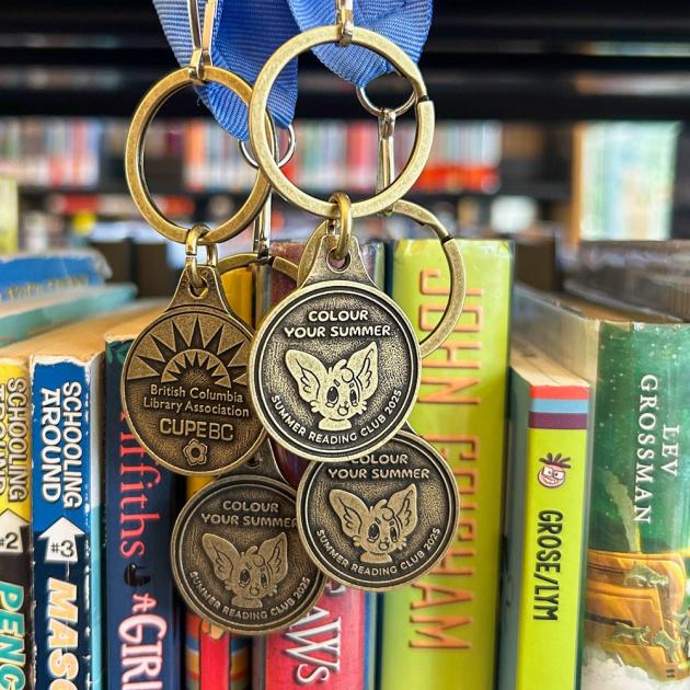 2025 SRC medals medals against books