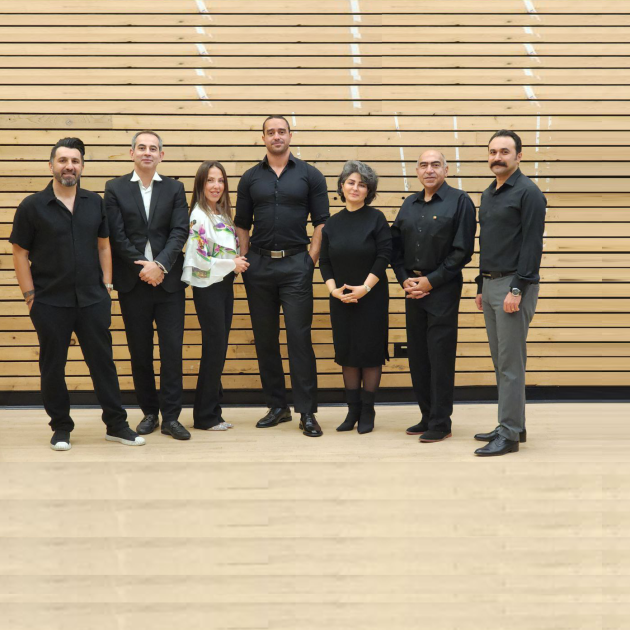 Members of the ATA Music Group standing in a line