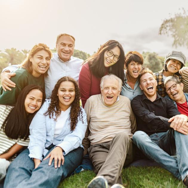A group of 10 smiling of people