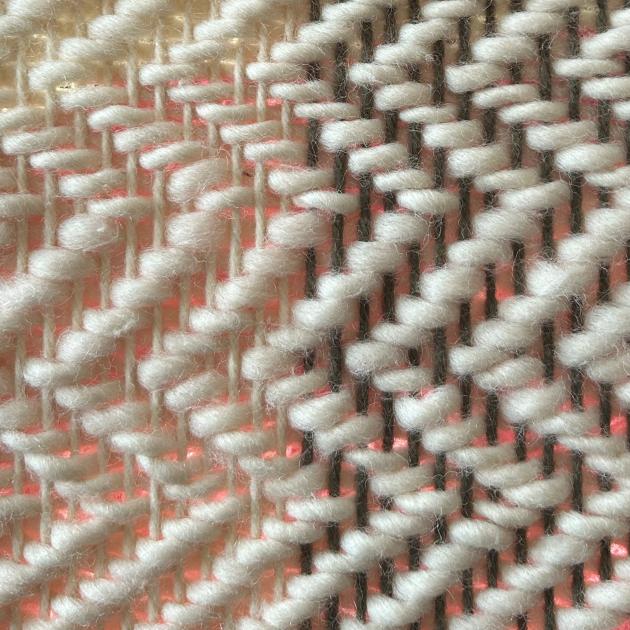 Close up image of wool weaving