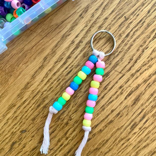 A keychain made of multicoloured pony beads 