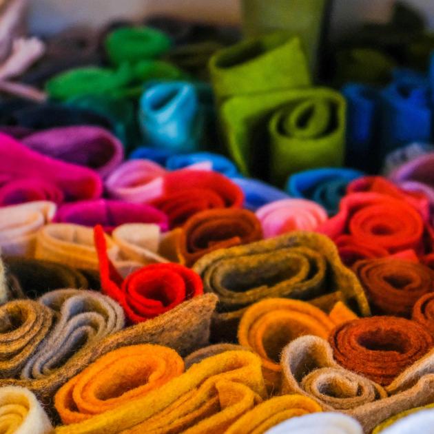 Rolls of felt fabric in many colours and shades