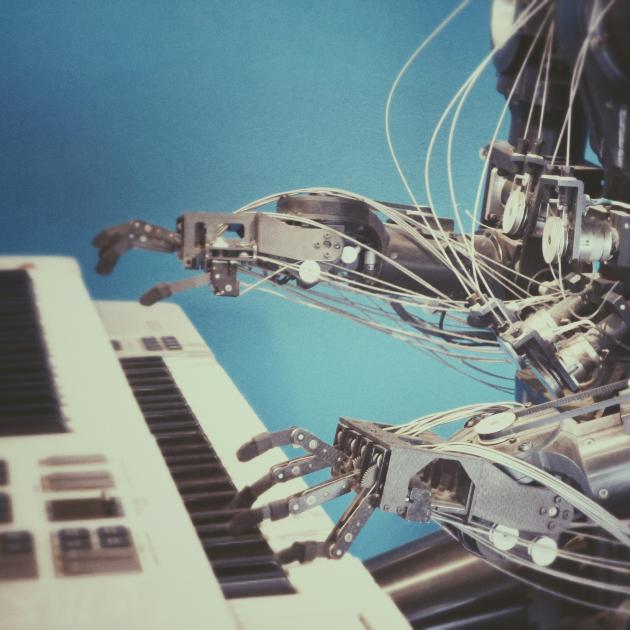 A robot playing a keyboard