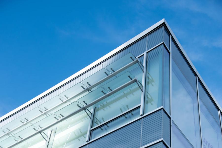 Detail picture of library building with a blue sky in the background