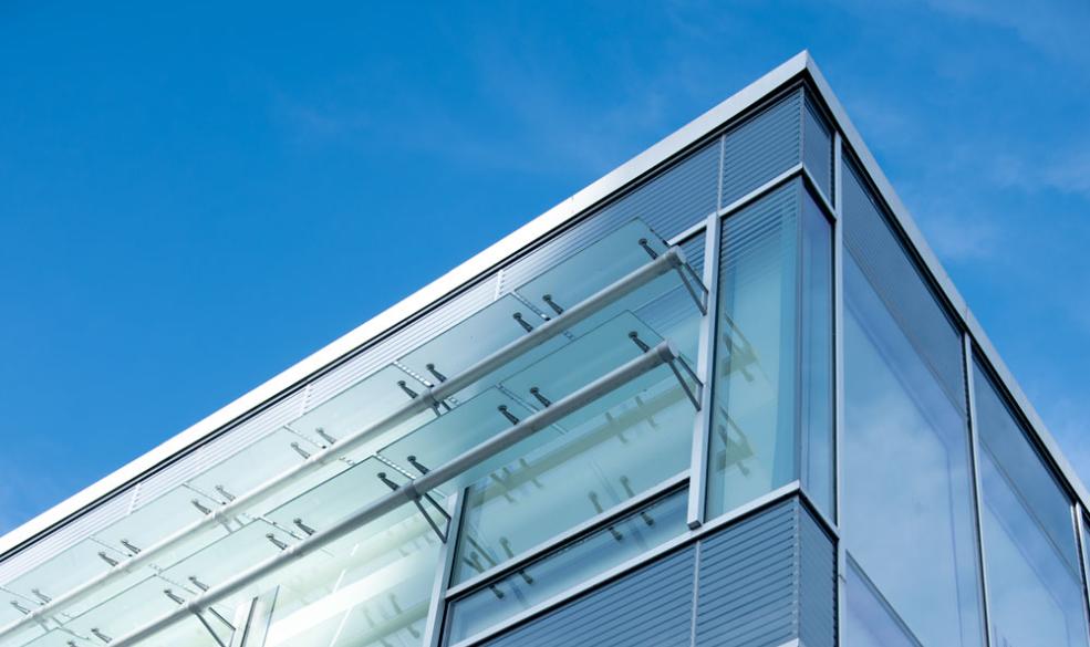 Detail picture of library building with a blue sky in the background