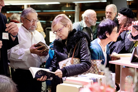 People browsing books at writers festival
