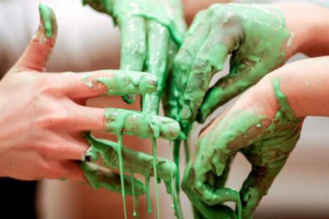 Picture of hands with green slime